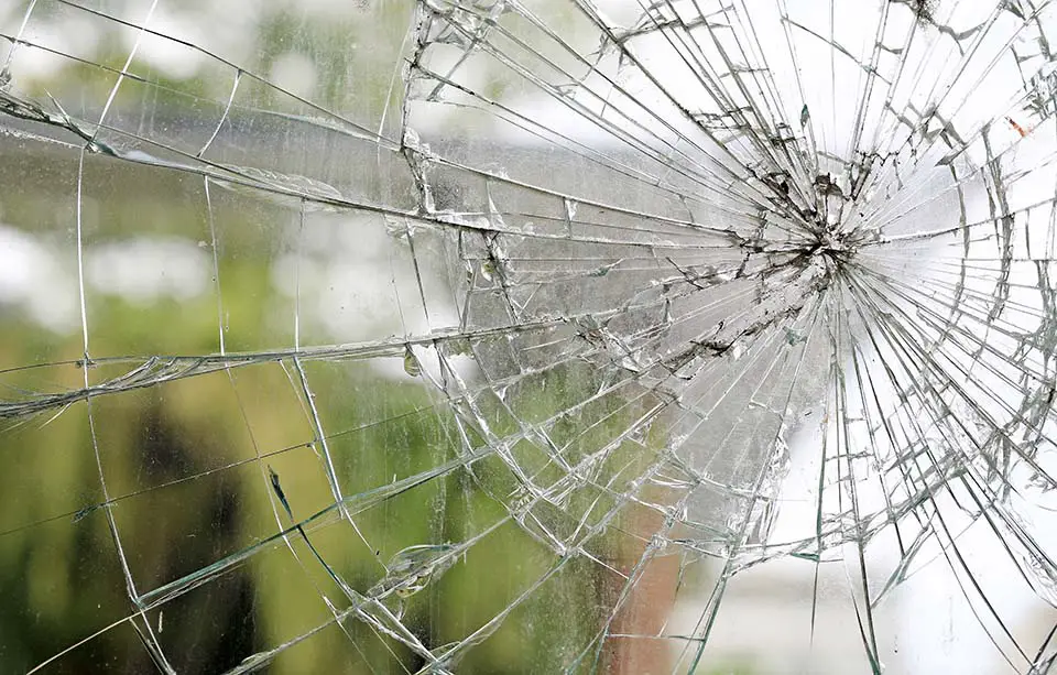 What happens if a golfer breaks a window