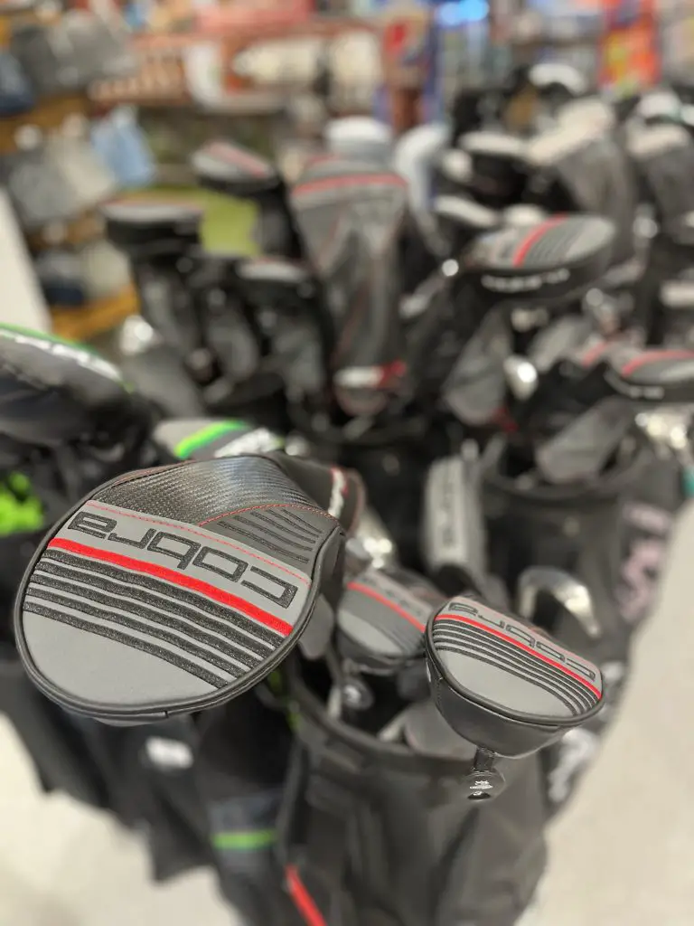closeup of golf clubs in bag